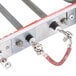 A Waring replacement heating element with wires attached to a metal panel.