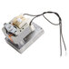 A small metal motor with wires and a black cord.