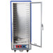 A large metal Metro holding and proofing cabinet with a clear door open.