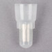 A white plastic crimp connector with a silver cap.