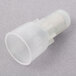 A close-up of a white plastic crimp connector with numbers on it.