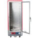 A red and silver Metro C5 holding and proofing cabinet with a clear door.