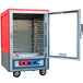 A red Metro C5 half size holding and proofing cabinet with a clear door open.