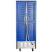 A blue Metro C5 series holding and proofing cabinet with solid Dutch doors.