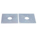 A pair of Waring metal plates with holes.