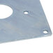 A close-up of a Waring motor plate for blenders with holes.