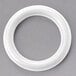 A white plastic Cecilware central pivot O-ring.