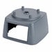 The top housing for a Waring blender, a grey plastic object with a hole in it.