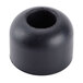 A black round rubber foot with a hole in it.