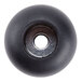 A black rubber round with a hole in it.