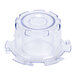 A clear plastic lid baffle for a Waring blender.