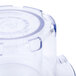 A clear plastic container with a blue top.