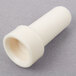 A white plastic Waring spacer pipe.