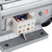 An ARY Vacmaster oil pump motor with red and blue wires.