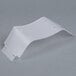 A white plastic Waring PCB board shield.