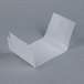 A white plastic sheet with a hole in it.