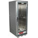 A large gray Metro C5 hot holding cabinet with shelves and a clear door.