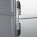 The closed solid metal Dutch doors on a gray Metro holding cabinet.