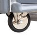 A gray Metro C5 hot holding cabinet with a wheel and a handle.