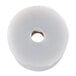 A white round plastic ring with a hole in the middle.