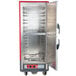 A red and stainless steel Metro C5 hot holding cabinet with solid doors open.