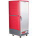 A red and silver Metro C5 hot holding cabinet with a black handle.