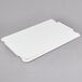 A white rectangular Cambro pizza dough proofing box lid.