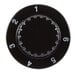 A black circular knob with white numbers.