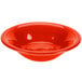 A red Fiesta stacking china bowl with a white background.