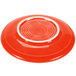 A Fiesta Poppy saucer with a white rim.