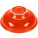 A red Fiesta pedestal serving bowl with a white rim.