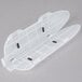 A white plastic Victorinox knife blade cover with black holes.