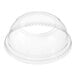 A clear plastic dome lid with a hole in it.