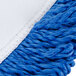 A close up of a blue and white mop pad.