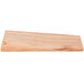 An American Metalcraft olive wood serving board on a wood surface.