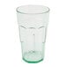 A Cambro Spanish green plastic tumbler.