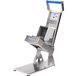 An Edlund stainless steel manual fruit and vegetable slicer with a blue handle.