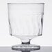 A Fineline clear plastic wine cup with a small silver base and white edge.