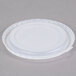 A white plastic lid on top of a translucent plastic lid.