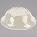 A white round melamine catering bowl with a lid on top.