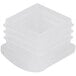 A white plastic square with four compartments.