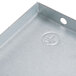 A metal plate with a hole in it.