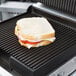 A sandwich on a Waring grill plate.