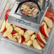 An Edlund Titan Max-Cut manual dicer with sliced apples inside