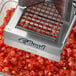 An Edlund Titan Max-Cut manual dicer with a piece of food in it.