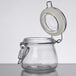 An American Metalcraft glass apothecary jar with a metal lid.