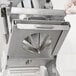 A person holding an Edlund 8-wedge blade assembly.