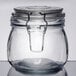 A clear glass American Metalcraft apothecary jar with a metal lid.