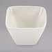 An American Metalcraft white square porcelain sauce cup.