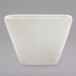 An American Metalcraft white square porcelain sauce cup.